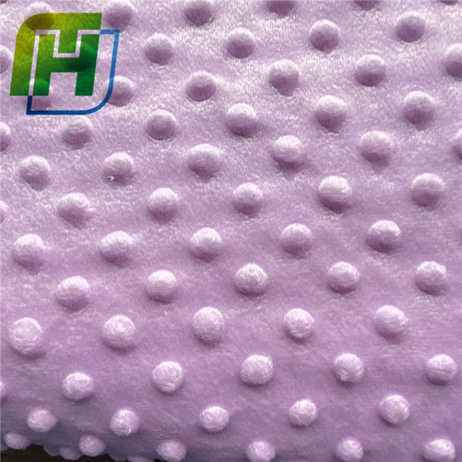 Orchid embossed dot minky fleece fabric